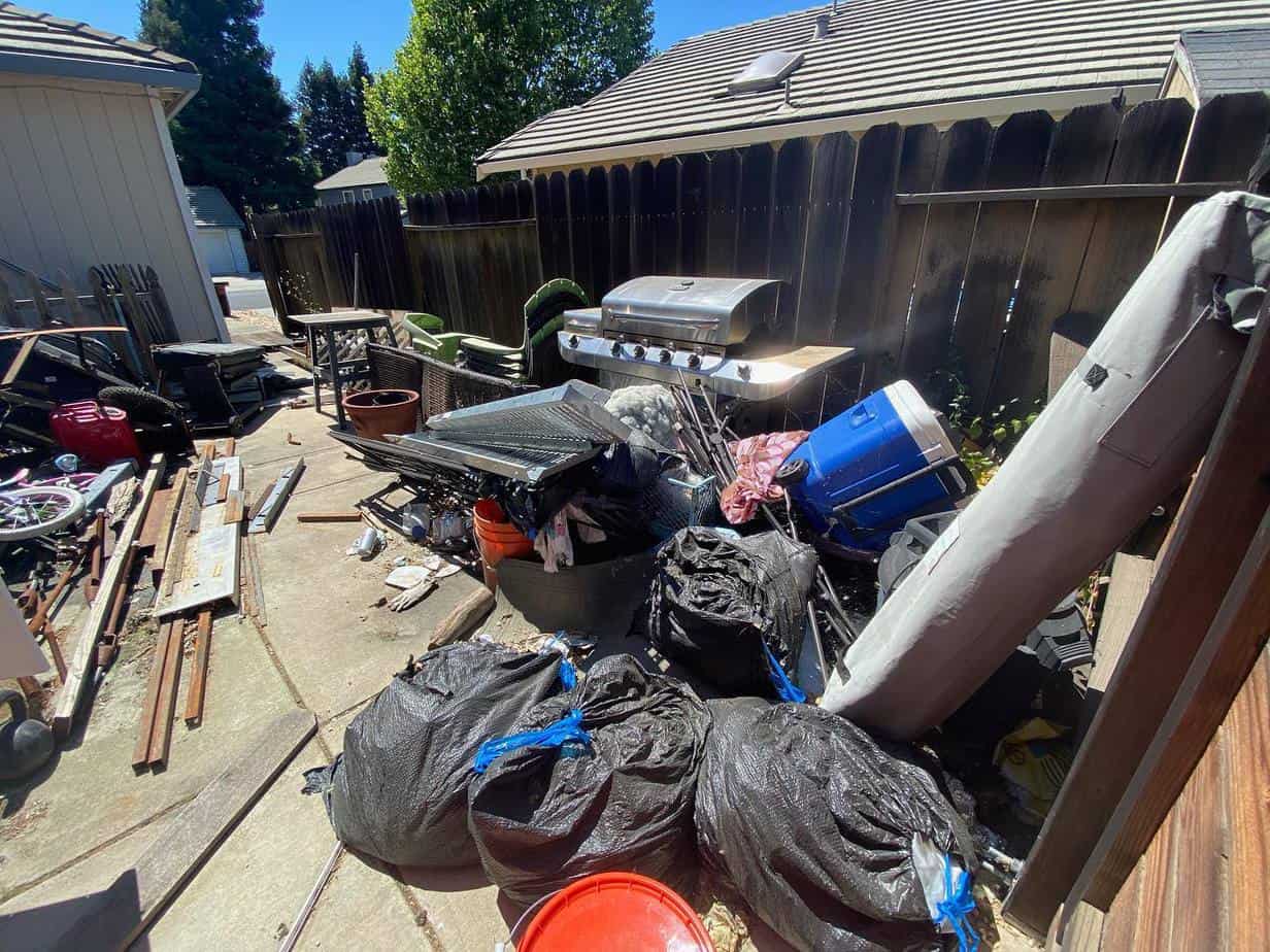 Appliance Removal & Yard Cleanup Before